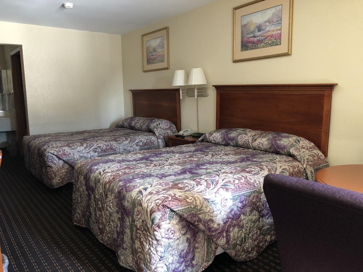 Airport Inn Motel Richmond Сандстон Экстерьер фото
